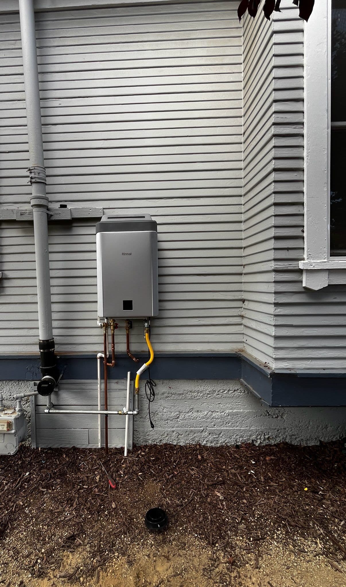 Sleek Tankless Water Heater Installation image